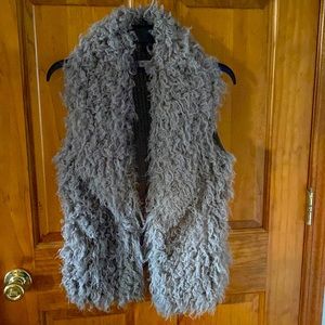 Jennifer Lopez Sweater Vest.